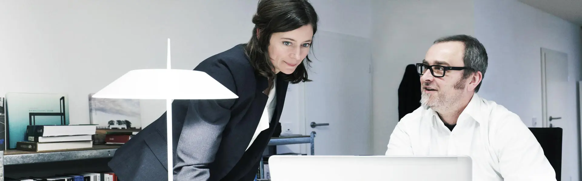 Two people archiving documents
