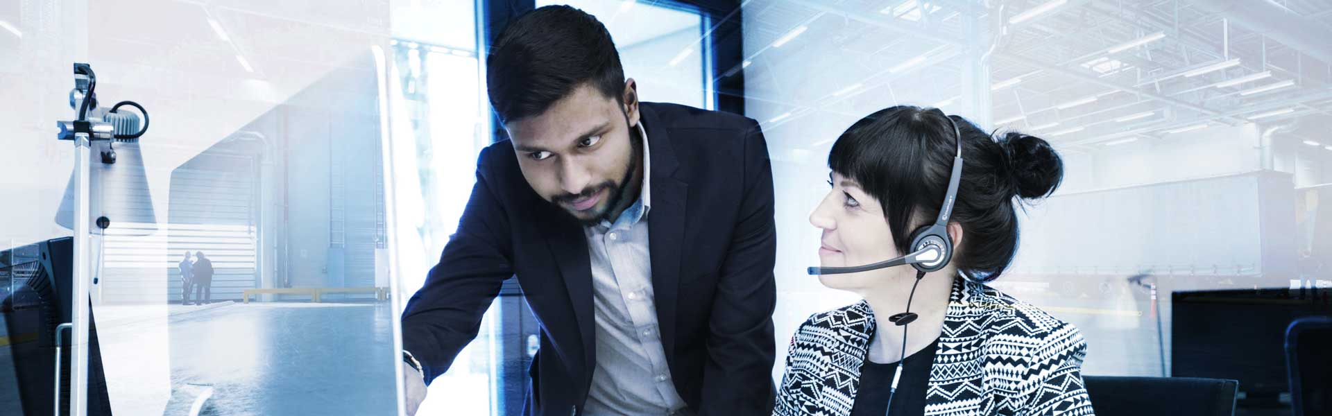Man and woman working with a DMS