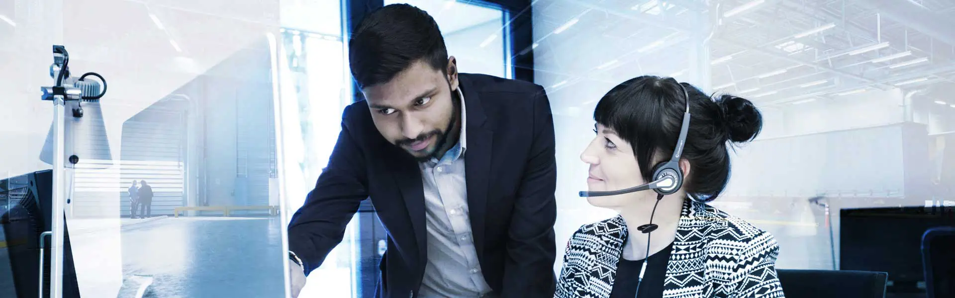 Man and woman working with a DMS
